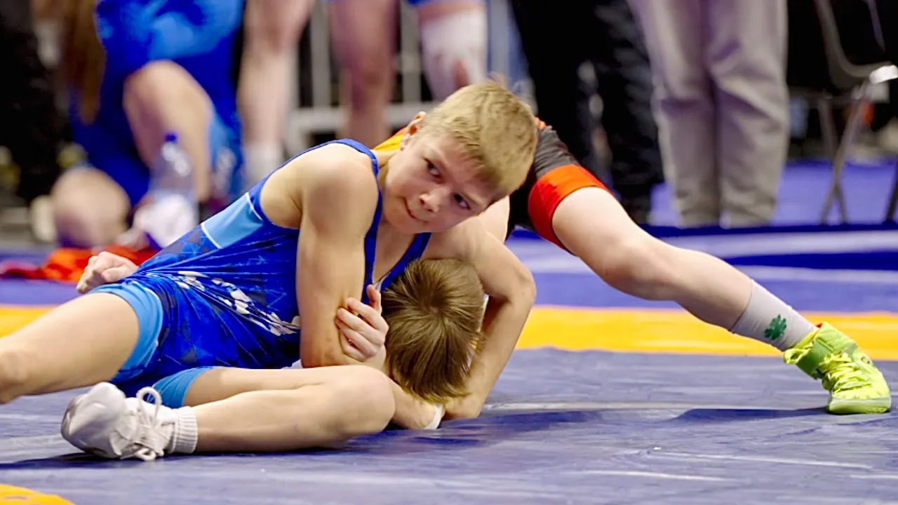 U13 Daniel Samuel (EST) vs Timur Kravchuk (UKR) 32kg. Greco-roman boys wrestling tournament. B-cam-m