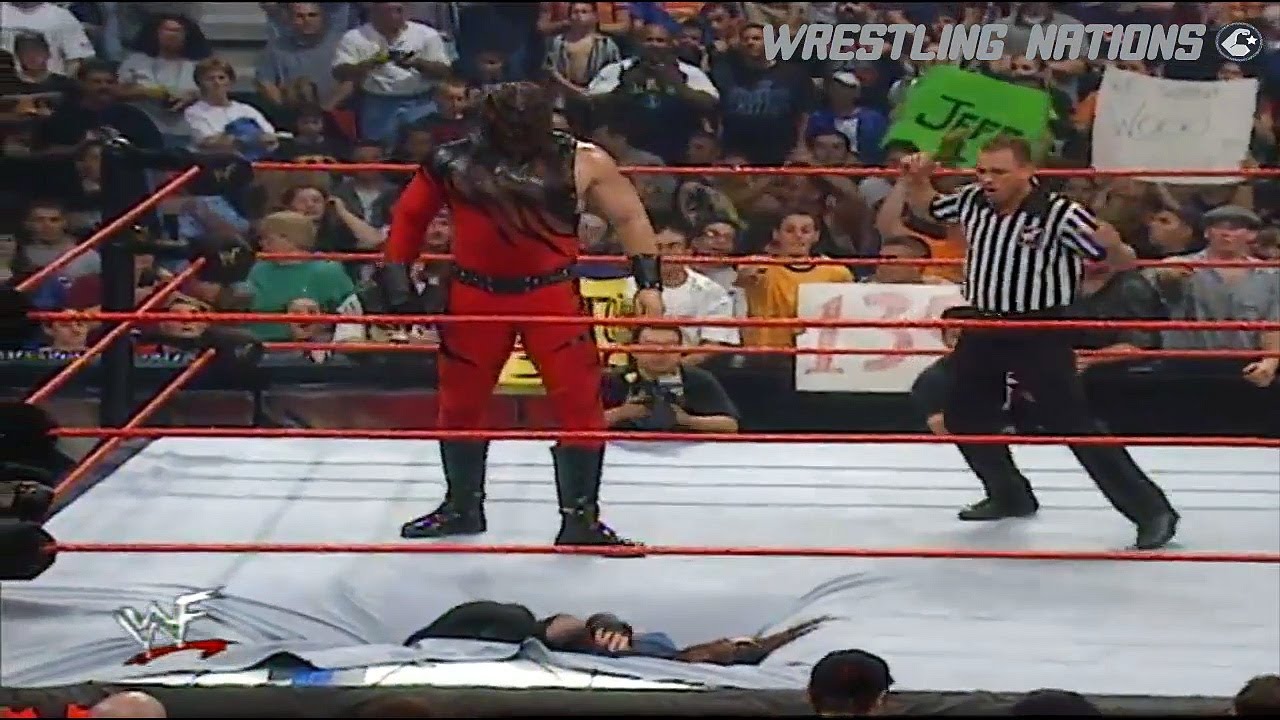 Kane's Huge Chockslam to The Undertaker After Chris Benoit and Undertaker Match background