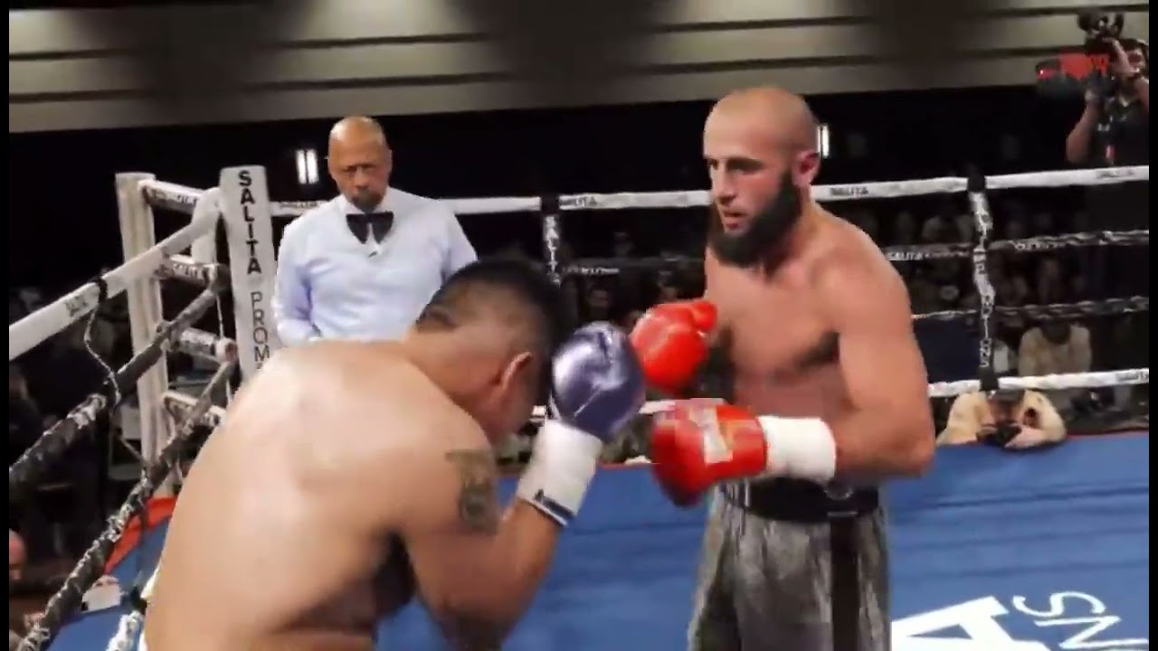 Ali Izmailov in action DETROIT background