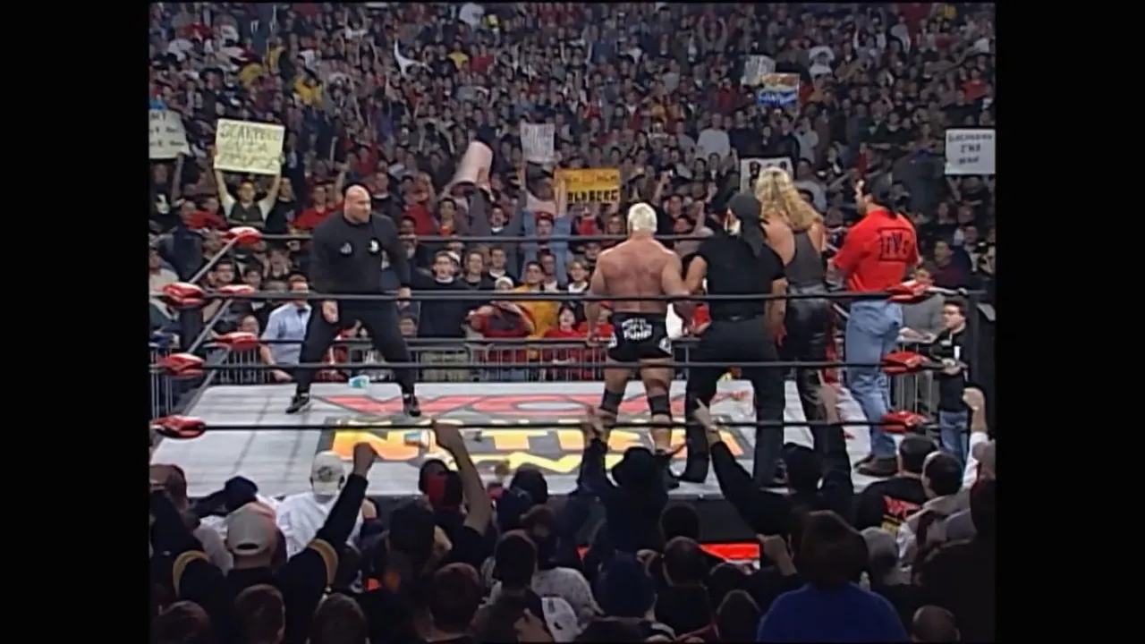 Goldberg confronts The nWo after the "Fingerpoke of Doom"