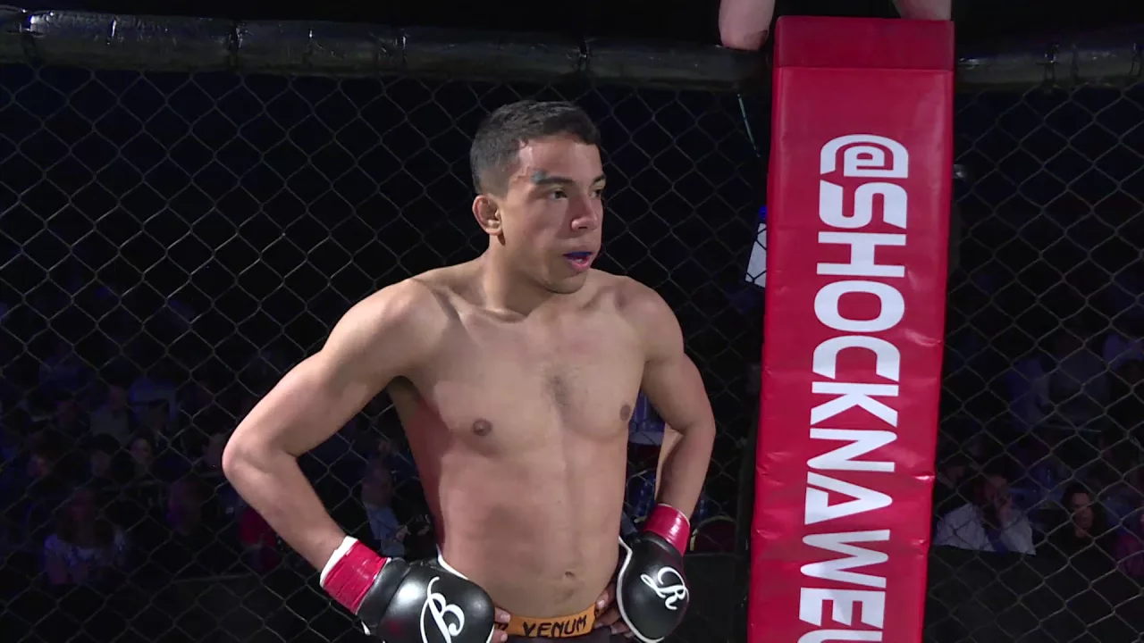 Shock N Awe 22 Amateur MMA Flyweight Title Aaron Laleye Vs Elliot Hoye background