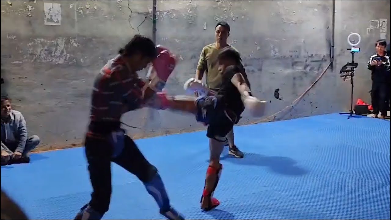 Bruce Lee Imitator Challenges Muay Thai background