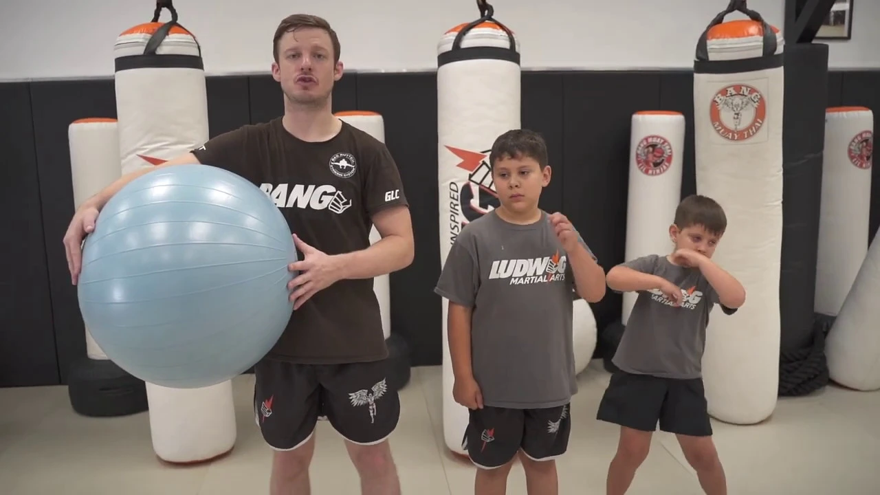 Little Ninjas Drill: Sprawls and Combo #8 With a Yoga Ball