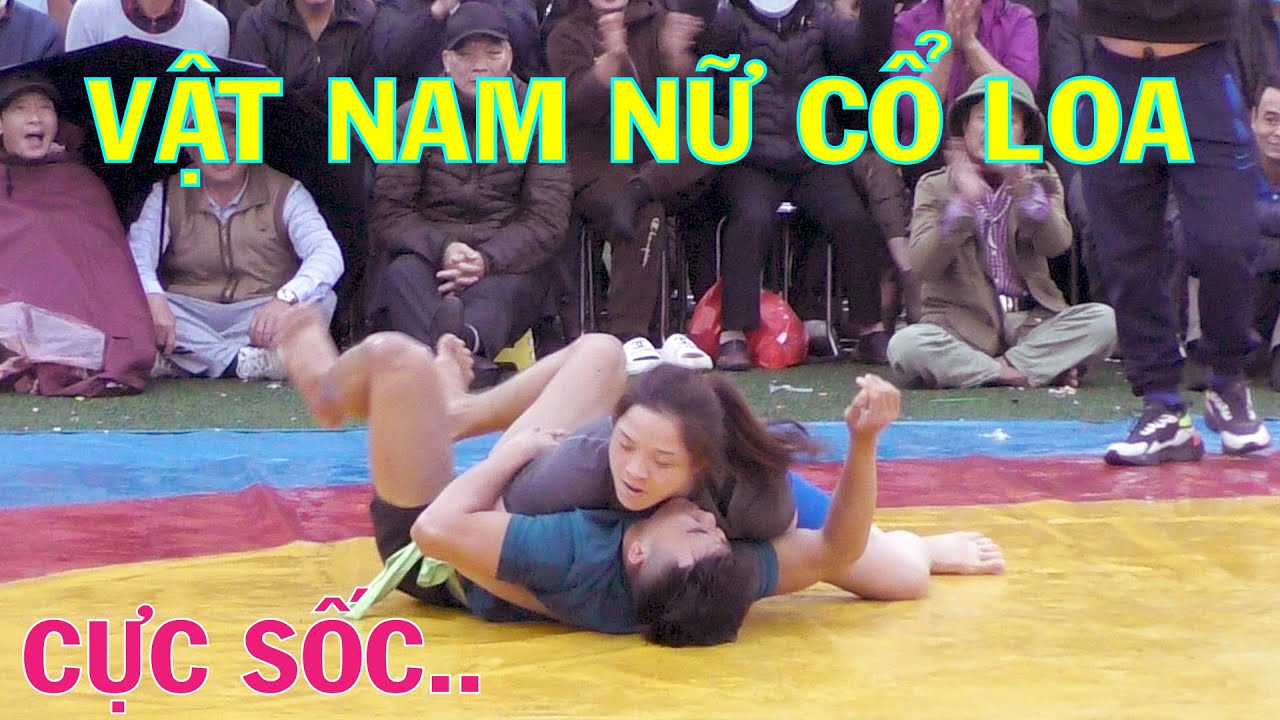 GIRLS vs. BOYS. Vật nam nữ - Nữ Đô Huế : Đ.T.Kim Oanh hạ gục 2 đô vật trẻ xứ Bắc.. background