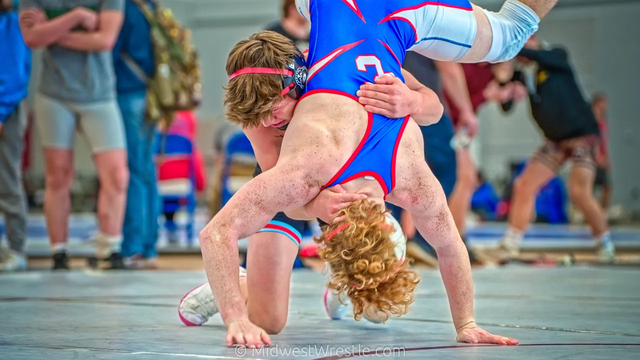 145 – Matt Impastato {G} of Dundee Crown IL vs. Nik Jimenez {R} of Woodstock Marian IL background
