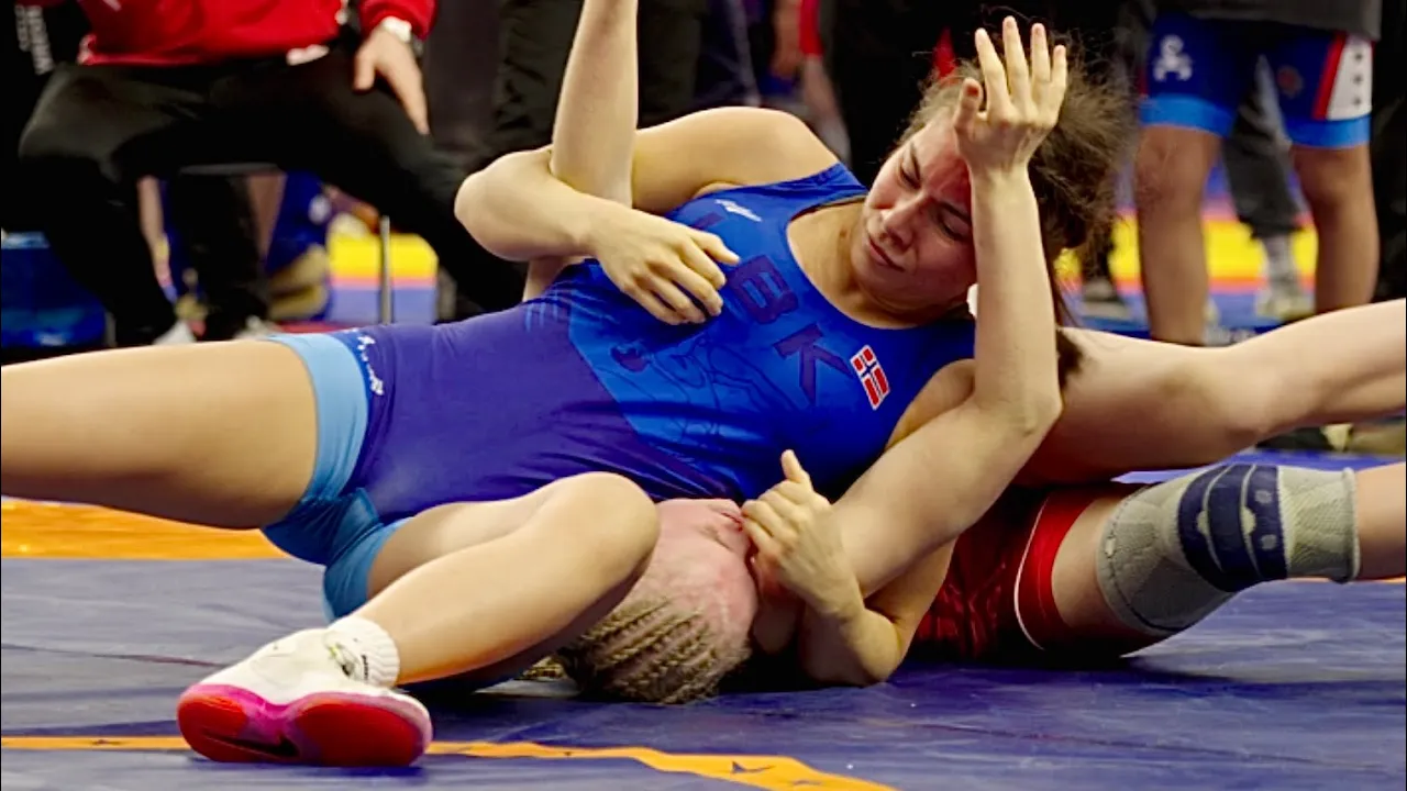 U20 Saga Svensson (SWE) vs Mirijam Lindas Hansen (NOR) 65kg. Womens wrestling tournament. B-cam-man background