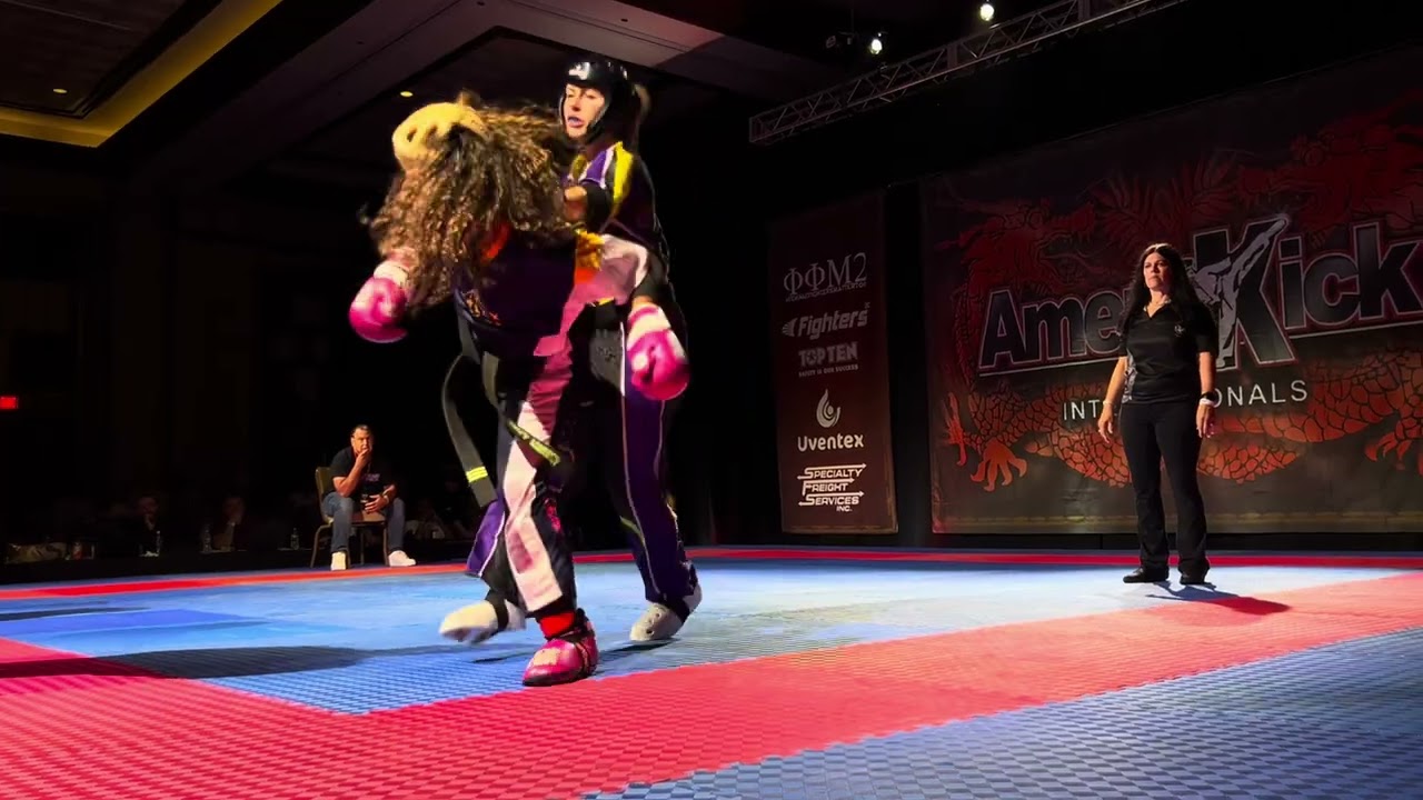 Paola Fonseca-Murphy vs Savannah Wolaniuk Open Weight Challenge - AmeriKick Internationals 2025 backdrop