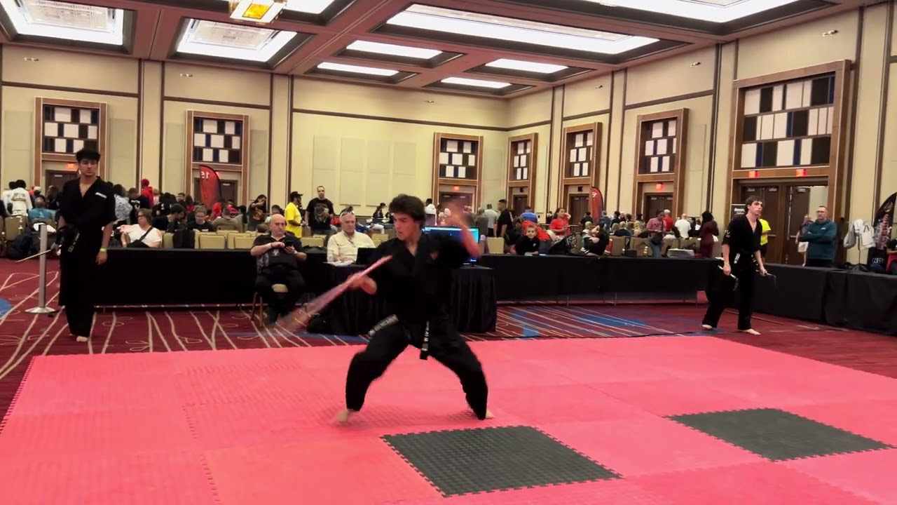 Nicolas Ménard Men's Extreme Weapons - AmeriKick Internationals 2025 background