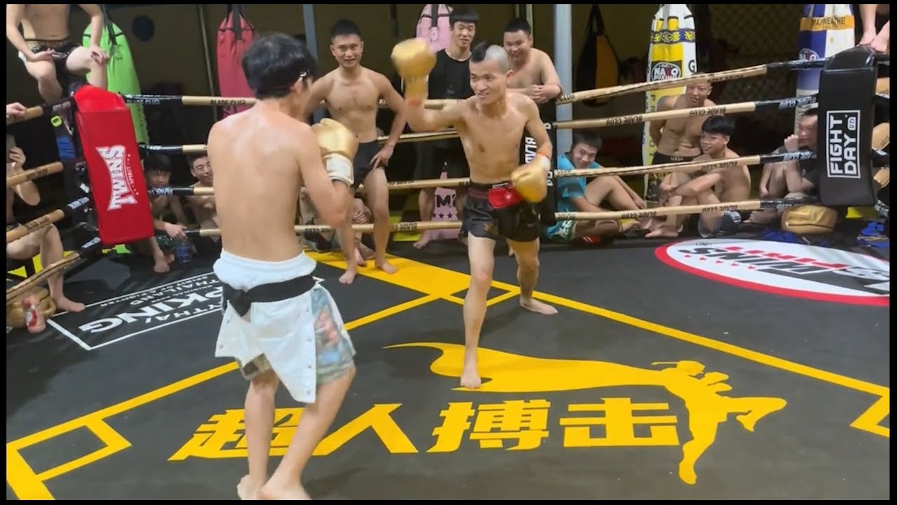 Kungfu Guy Challenges Muay Thai Guy Pretending To Do Kungfu background