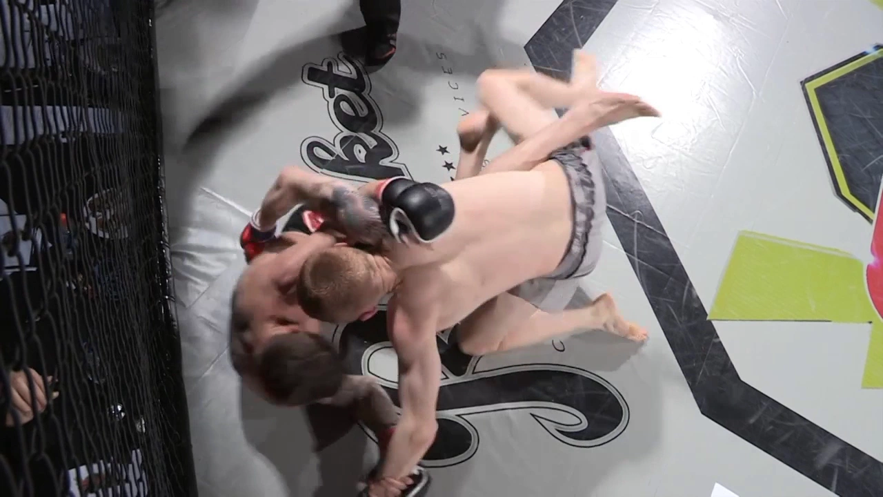 Ashley Kilvington VS Elliot Hoye - Shock N Awe 24 background