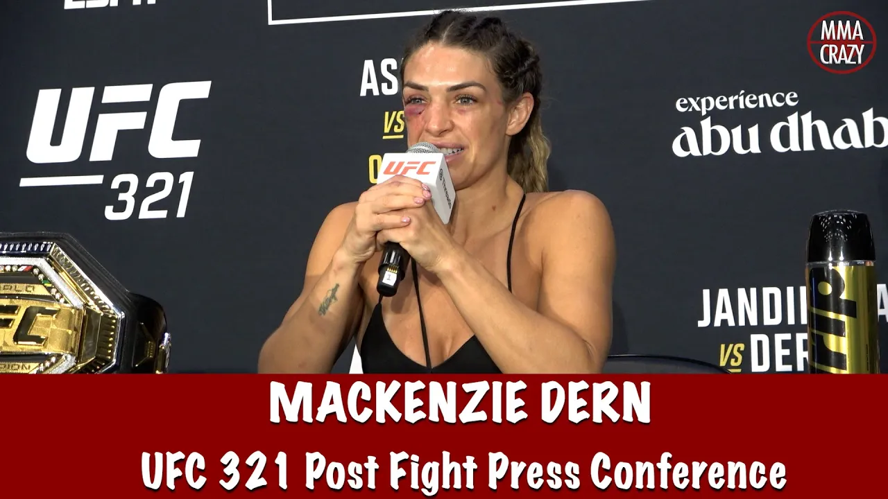 Mackenzie Dern reacts to championship win over Virna Jandiroba at UFC 321 background