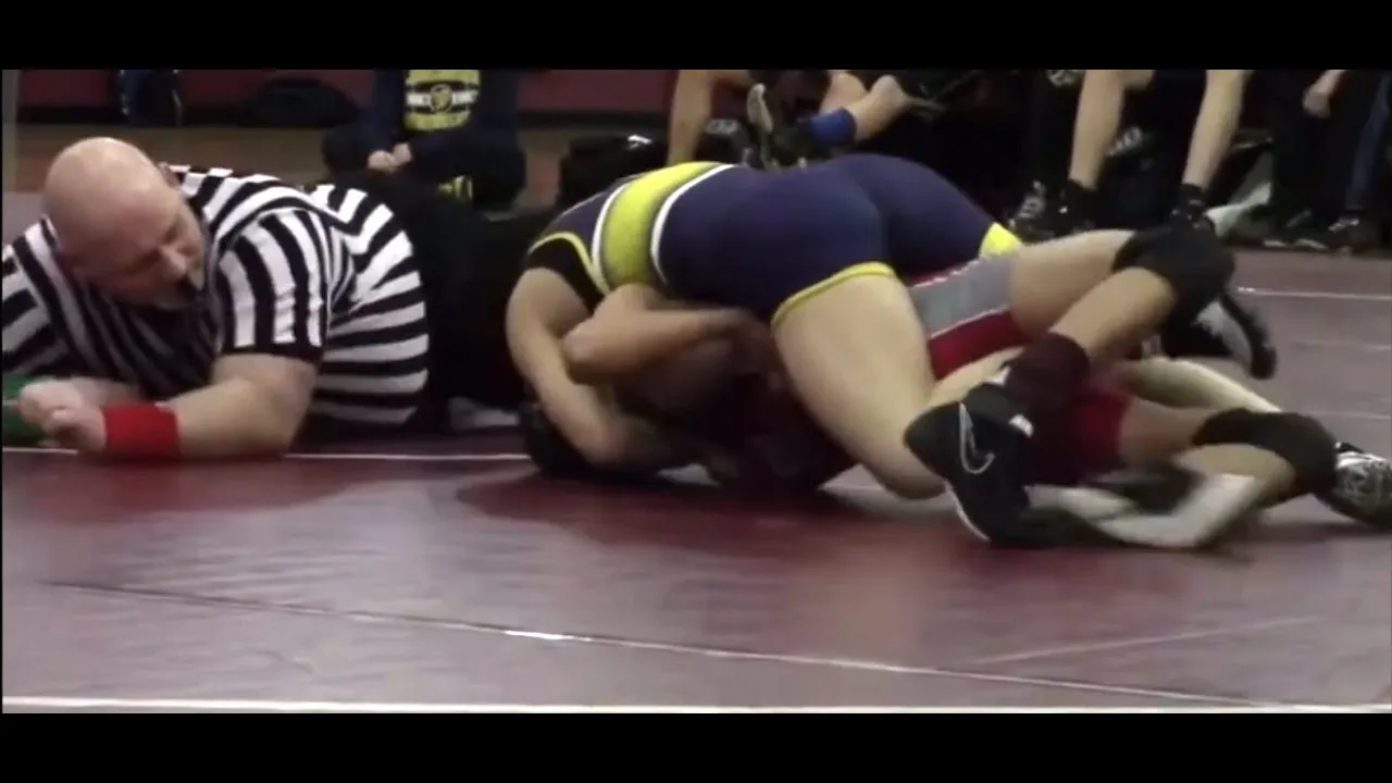 Total Domination! Girl Wrestler Pins Male Opponent background
