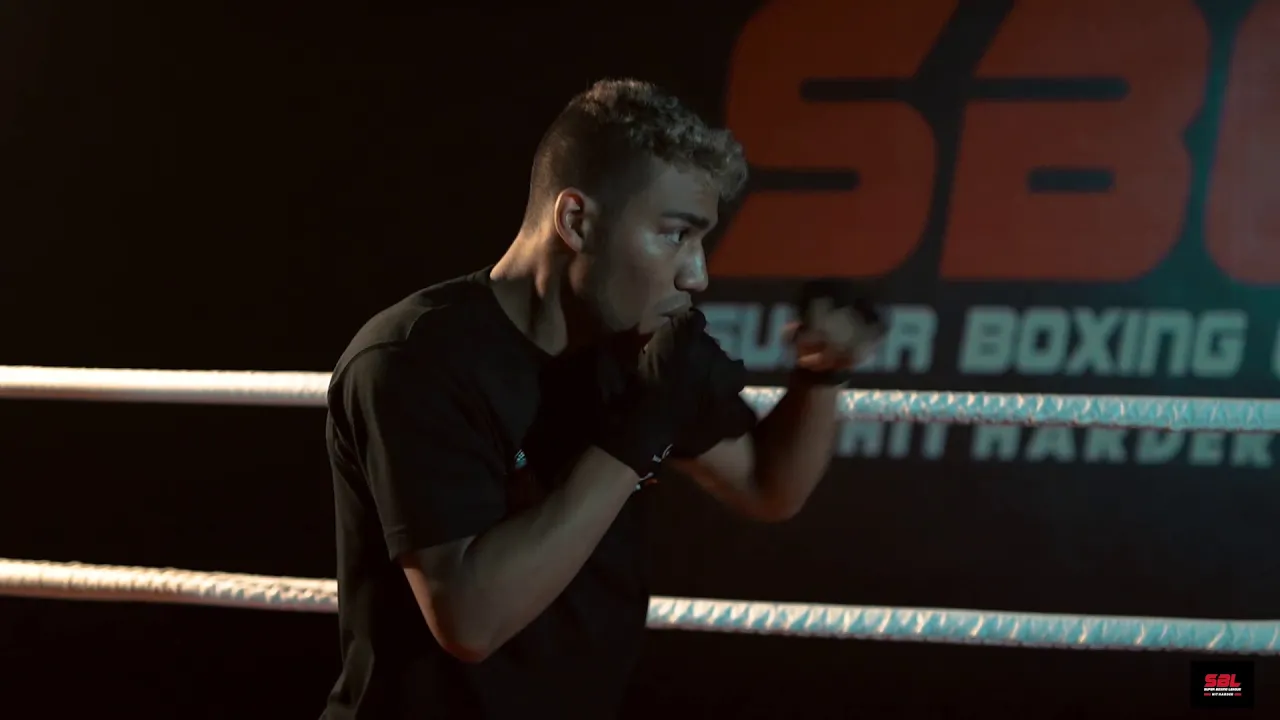 SBL | One Round with Rodrigue Caraballo background