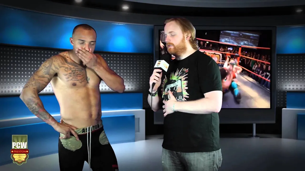 Ashton Smith gets ready for Iestyn Rees at PCW SuperShow 5