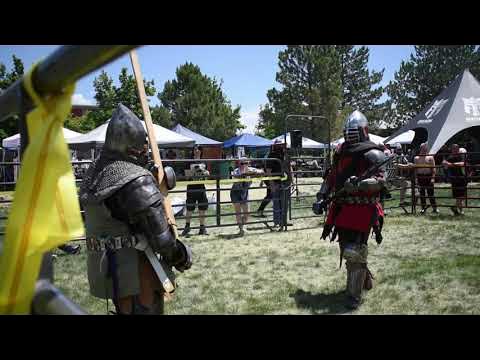 Knights fight in the Armored Combat Worldwide Polearm at Fitcon ends in standing knockout background