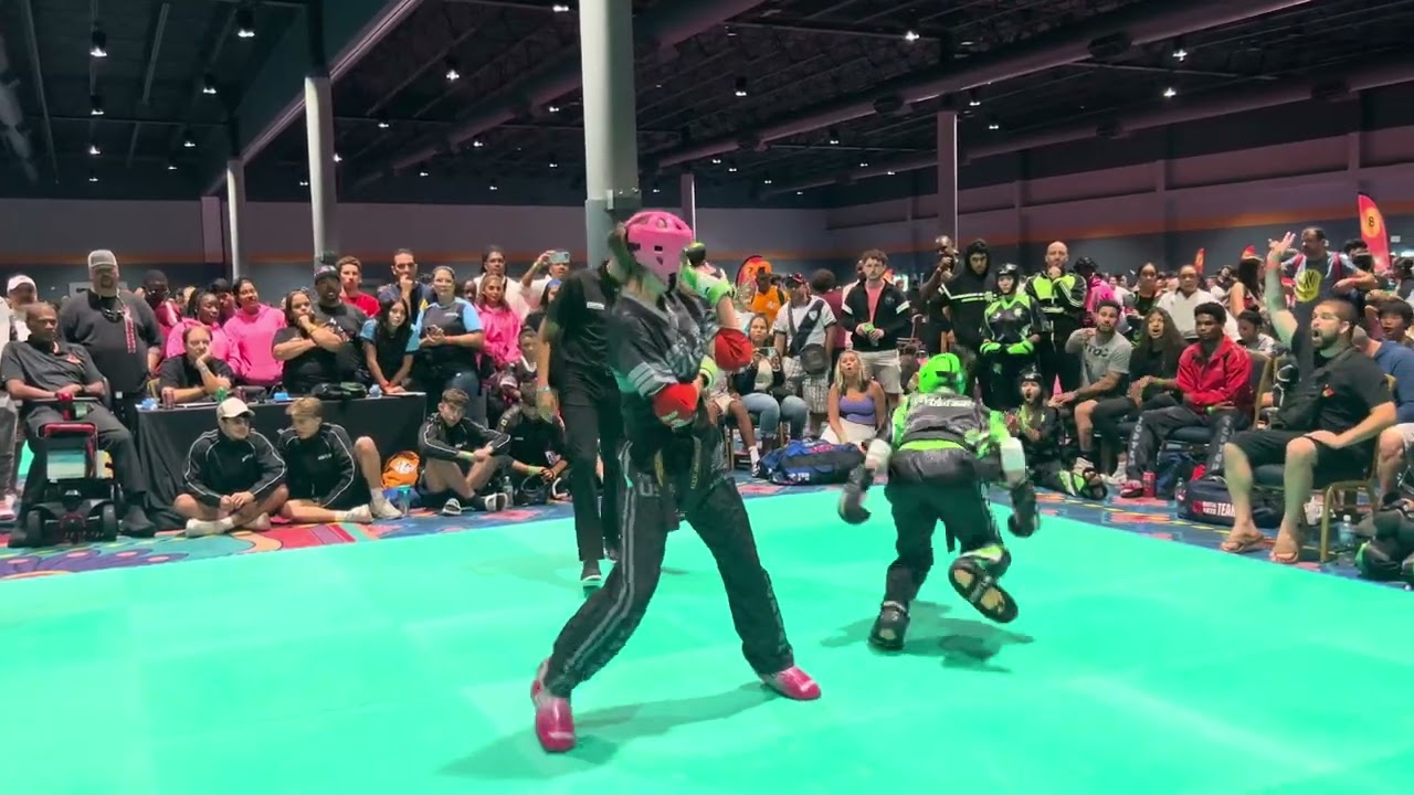 Team Revolution vs Top Ten Team USA Women's Team Sparring - US Open 2025 background