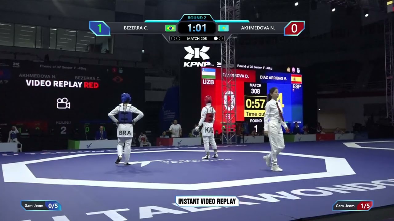 208 Round of 32 F 49kg BRA BEZERRA C KAZ AKHMEDOVA N PGM background