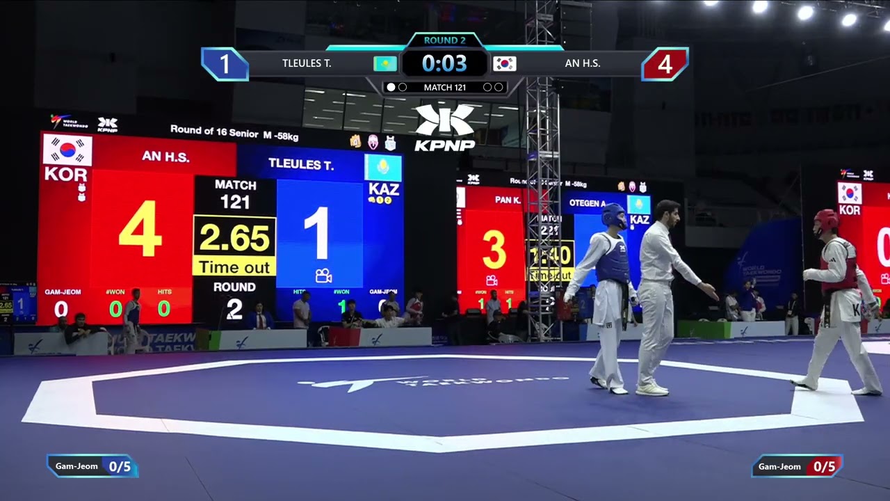 121 Round of 16 M 58kg KAZ TLEULES T KOR AN H S PGM background