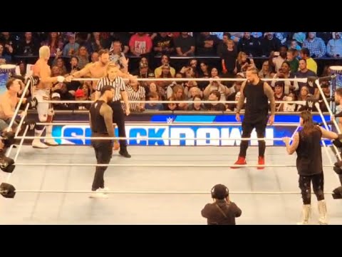 Jimmy Uso, Finn Balor, Dominik & Solo Sikoa vs Jey Uso, John Cena, Cody Rhodes & LA Knight Dar Match background