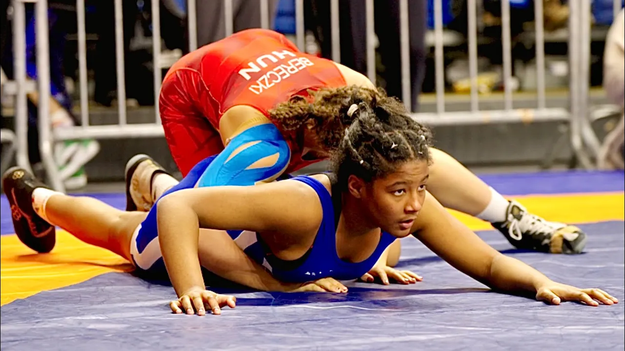 U17 Reka Bereczki (KOS) vs Yamina Zeghadi (FRA) 69kg. Womens girls youth wrestling. B-cam-man background
