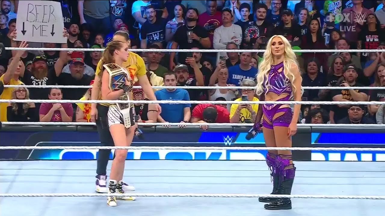 Ronda Rousey VS Charlotte Flair background