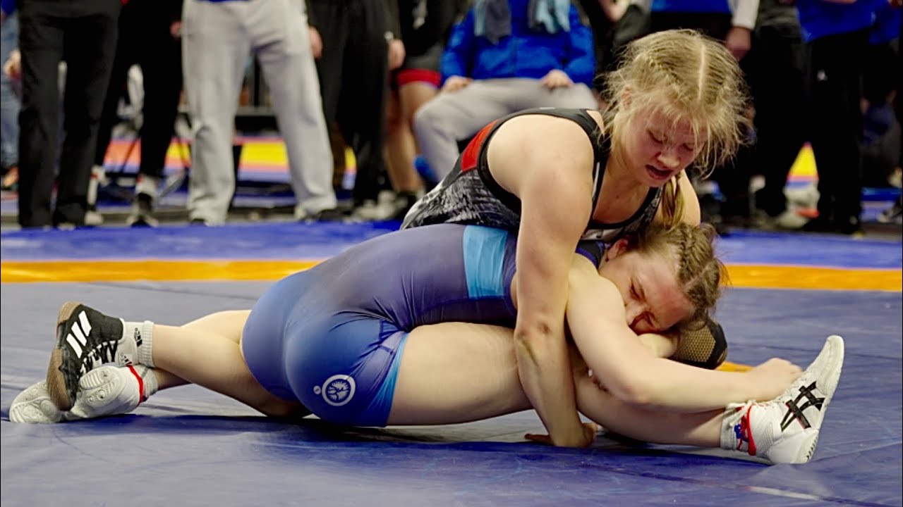 U20 Sara Rantonen (FIN) vs Ebba Öhman (SWE) 55kg. Girls youth womens wrestling tournament. B-cam-man background