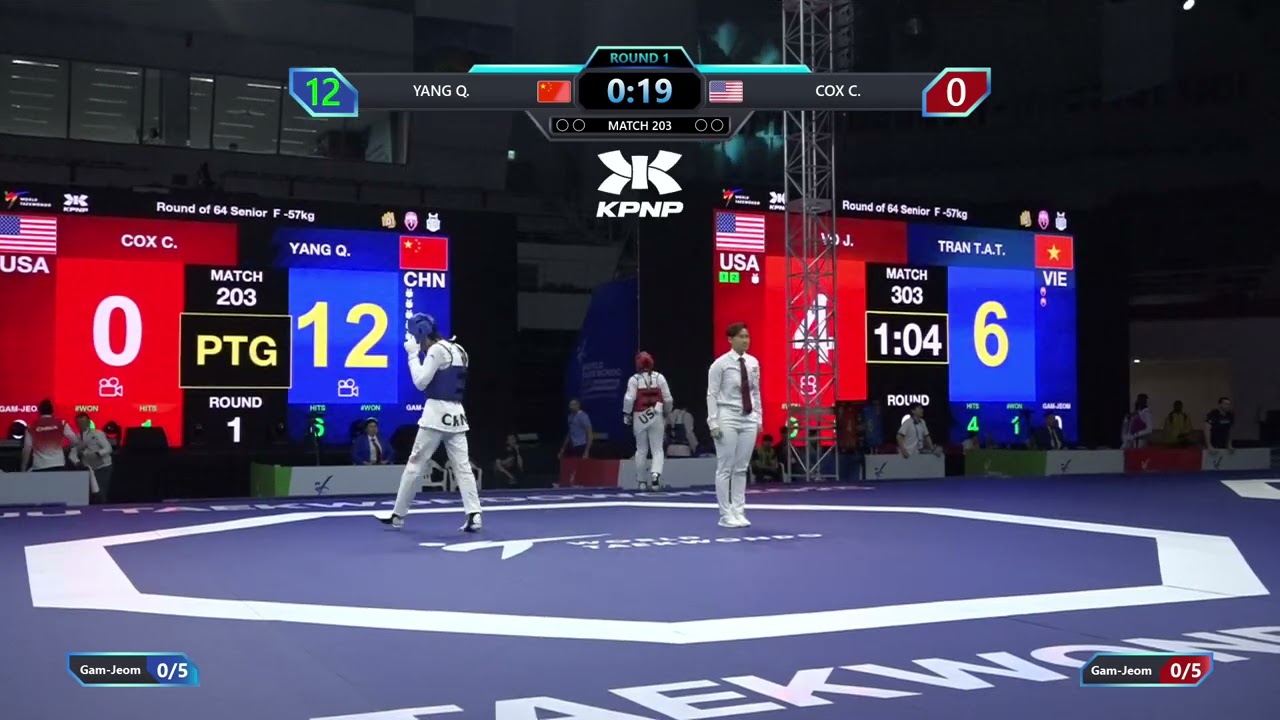 203 Round of 64 F 57kg CHN YANG Q USA COX C PGM background
