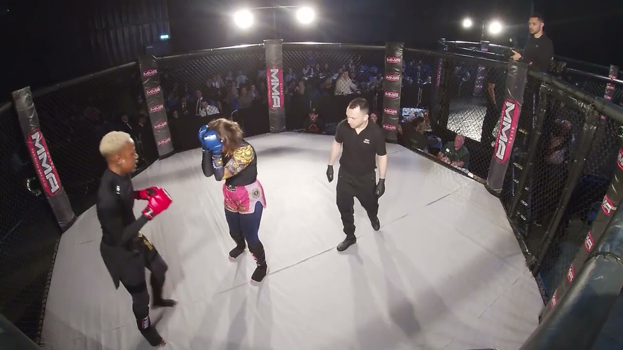 MANCHESTER MMA CAGE 1 STEPH LITTLE VS EIRYS THE GREMLIN PROSELKOV background