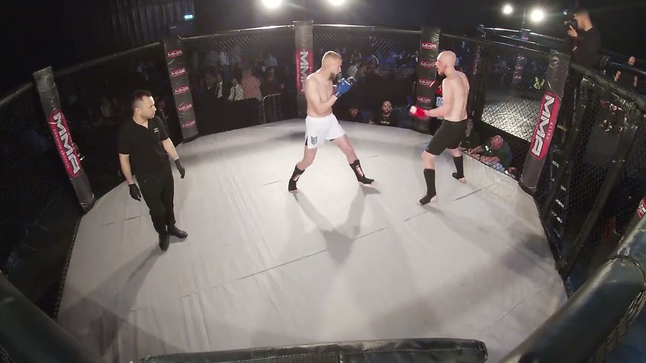 MANCHESTER MMA CAGE 1 MARTIN GILES VS MATTHEW BAKER background