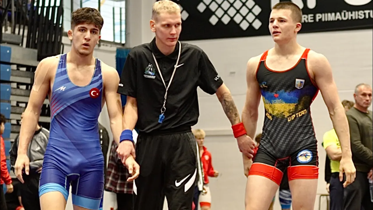 U17 Oleksandr Budarev (UKR) vs Umut Gül (TUR) 65kg. Greco-roman boys youth wrestling. B-cam-man background