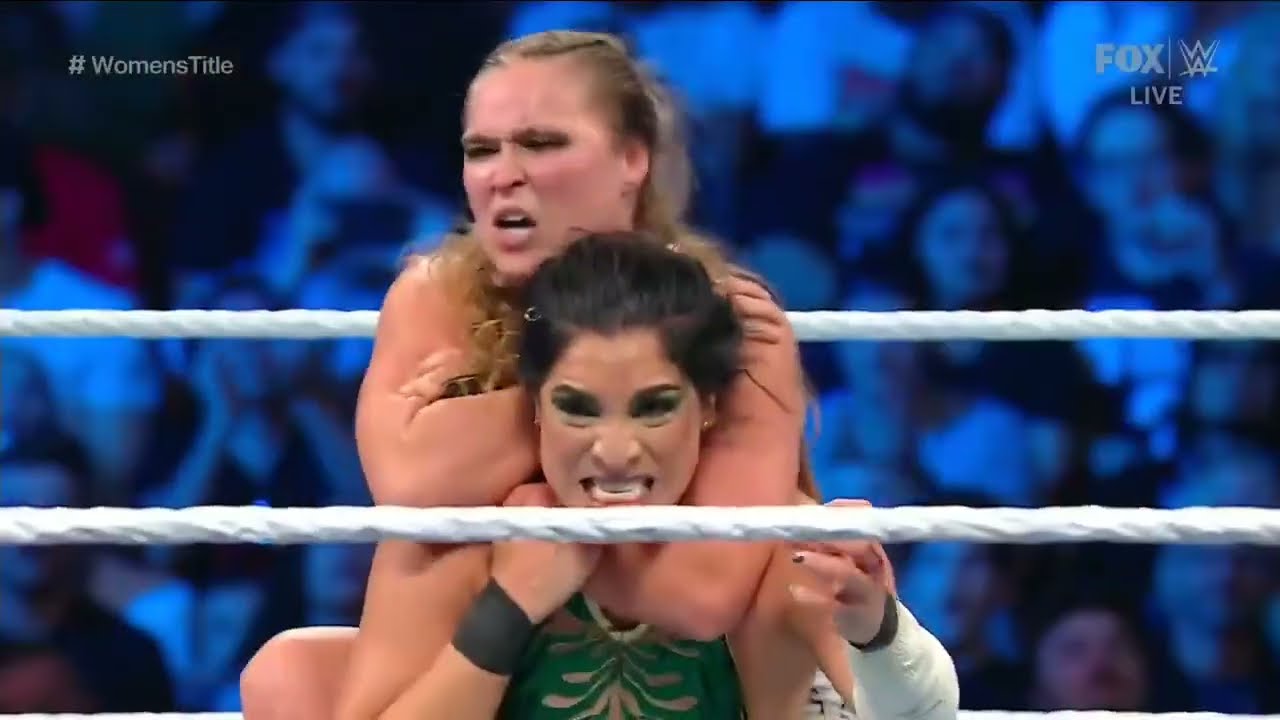 Ronda Rousey VS Raquel Rodriguez 2/2 background