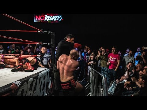 Stu Bennett Bullhammers Zack Gibson During No Regrets Rumble background