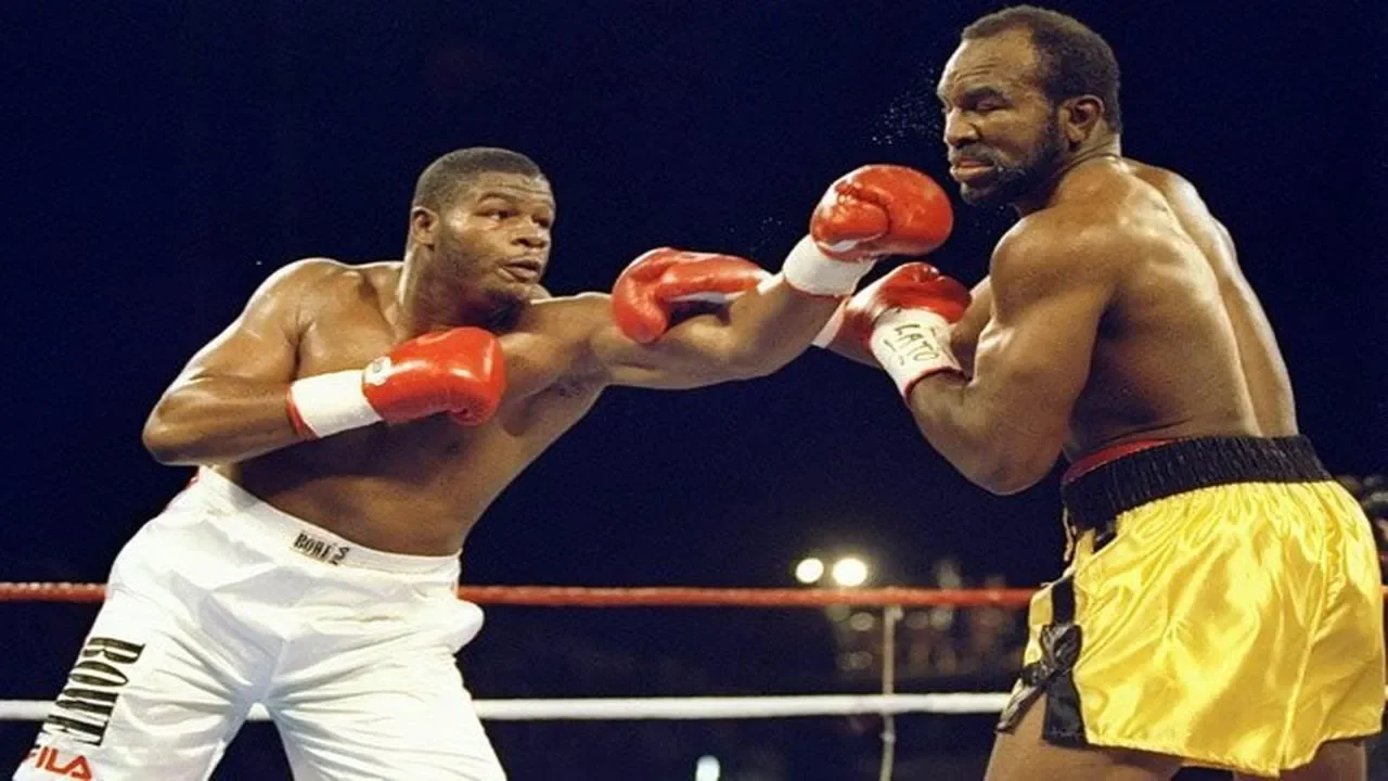Riddick Bowe - Masterful Jab background