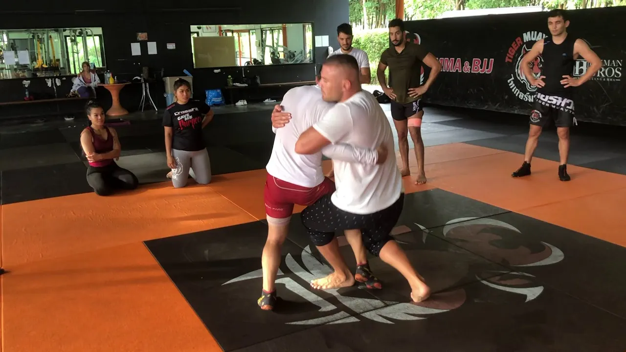 Anatoly Malykhin teaches wrestling takedown @ Tiger Muay Thai background