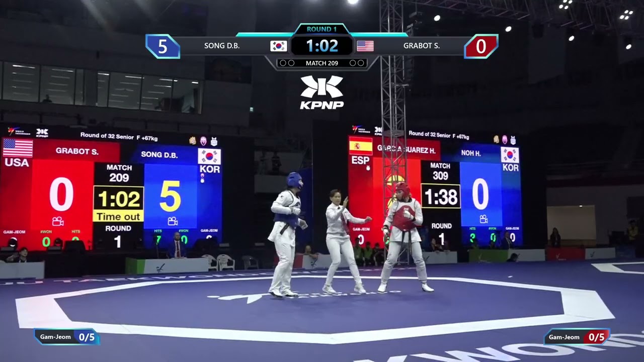 209 Round of 32 F +67kg KOR SONG D B USA GRABOT S PGM