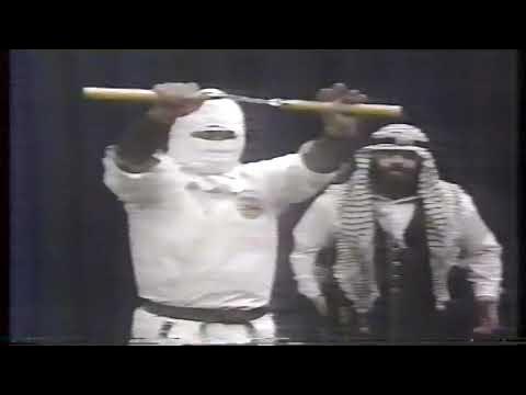 Gypsy Joe vs. Mr. Pogo - Chain match inside a Steel Cage 3/28/85 background