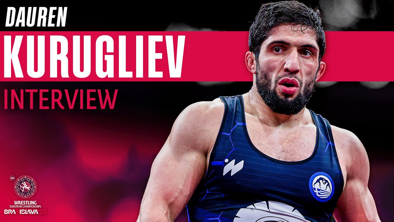 Dauren KURUGLIEV (GRE) talks about winning his fourth European gold medal backdrop