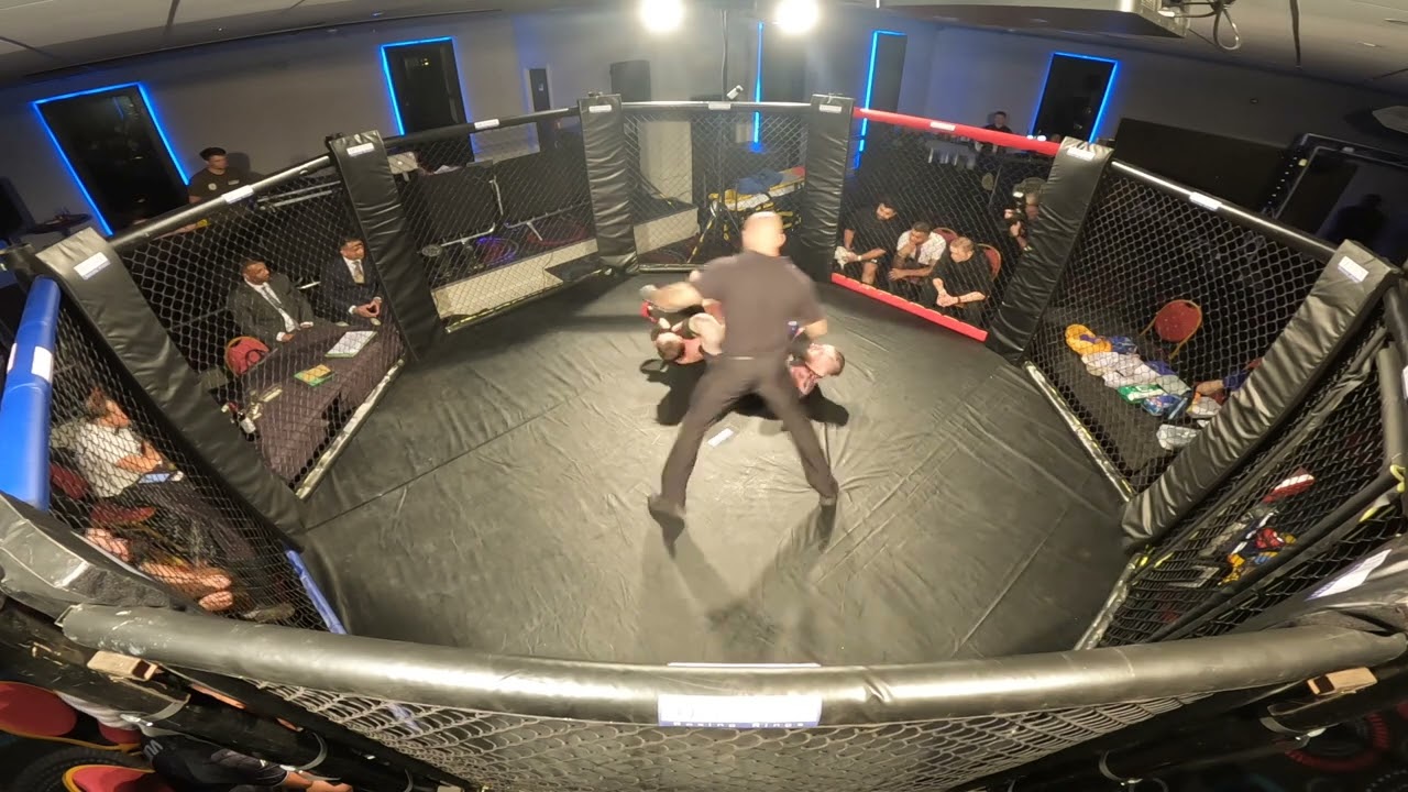 NORTHAMPTON | ULTRA MMA | TERRENCE BUCKSHOT BUCKLAND VS FEREL FORRESTAL TBC background