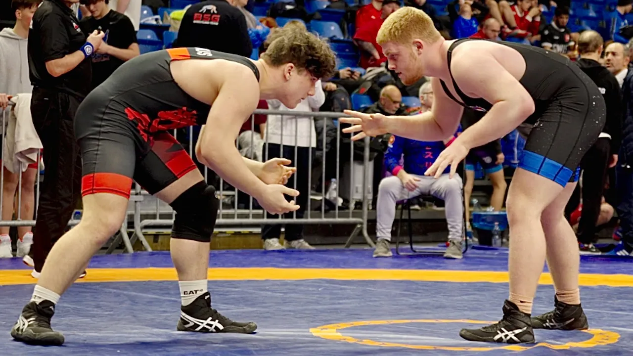 U17 Nojus Mickevicius (LTU) vs Michal Iwanski (POL) 92kg. Freestyle boys wrestling. B-cam-man background