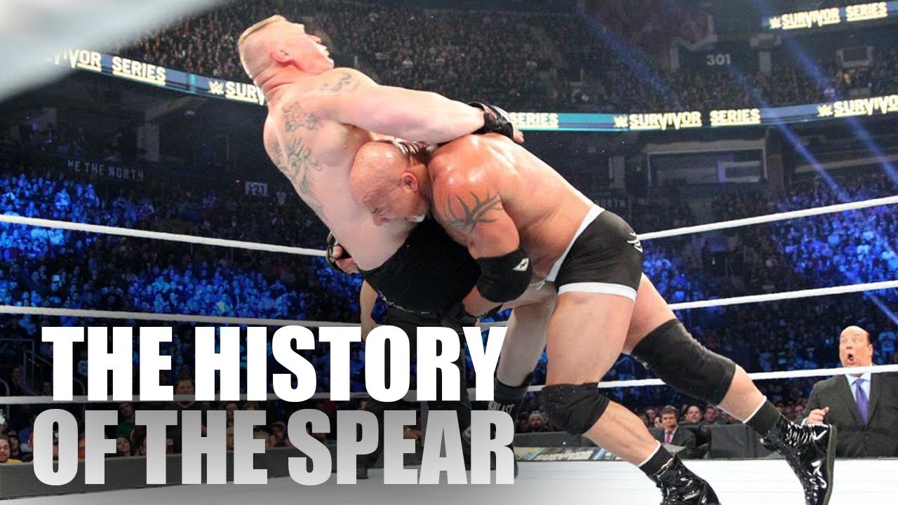 The History Of The Spear | Wrestling Move Origins background