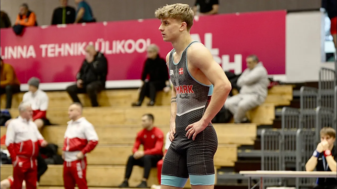 Piotr Stolarczyk (POL) vs Rasmus Ulriksen (DEN) 72kg. Greco-roman men wrestling tournament. background
