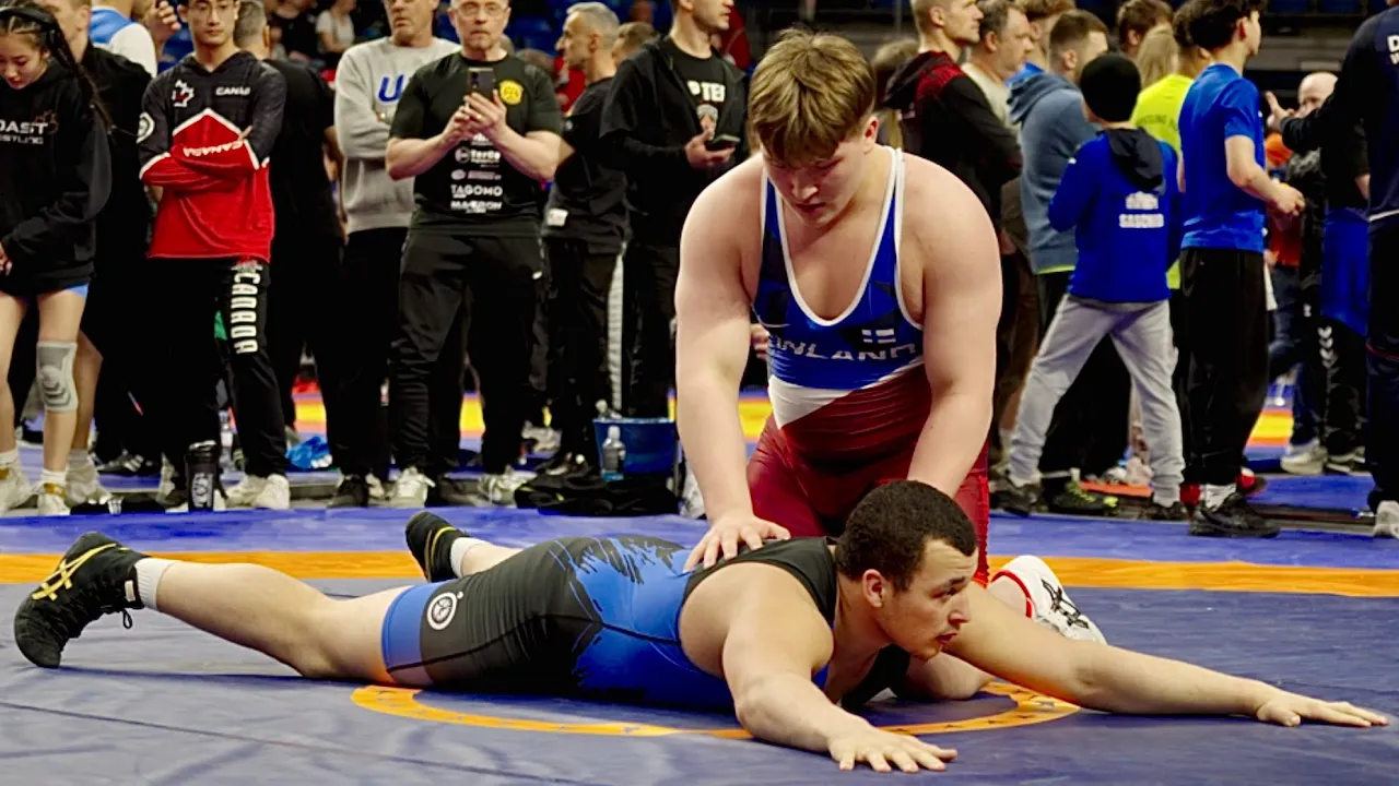 U20 Roope Rusi (FIN) vs Yones Laadili (FRA) 130kg. Greco-roman men wrestling tournament. B-cam-man