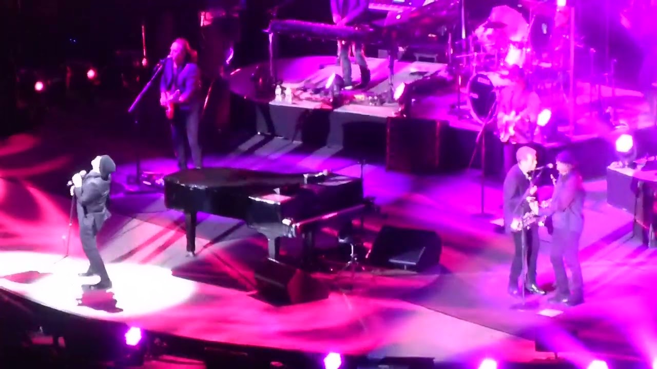 Billy Joel - It's Still Rock and Roll to Me backdrop