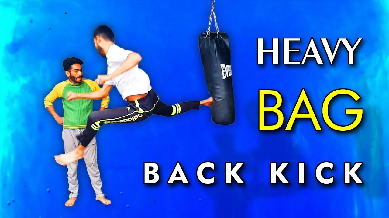 HEAVY BAG TRAINING - How To Back Kick The Heavy Bag - Taekwondo background