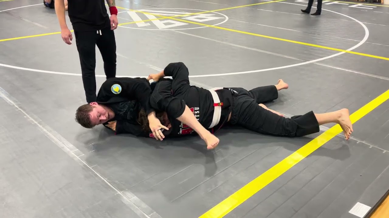 BJJ Open Weight White Belt Match With Unexpected Moves backdrop