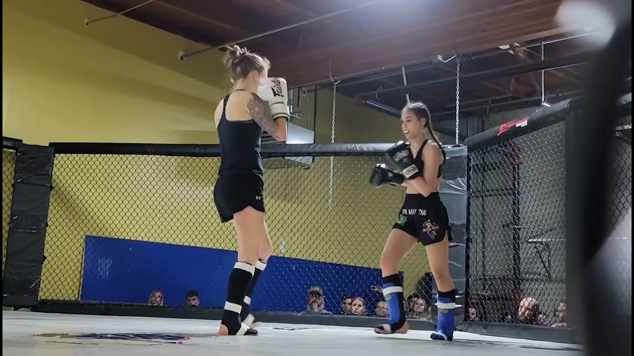 Joy Hufford vs. Sarah Vansandt at West Coast Fight Team smoker event background