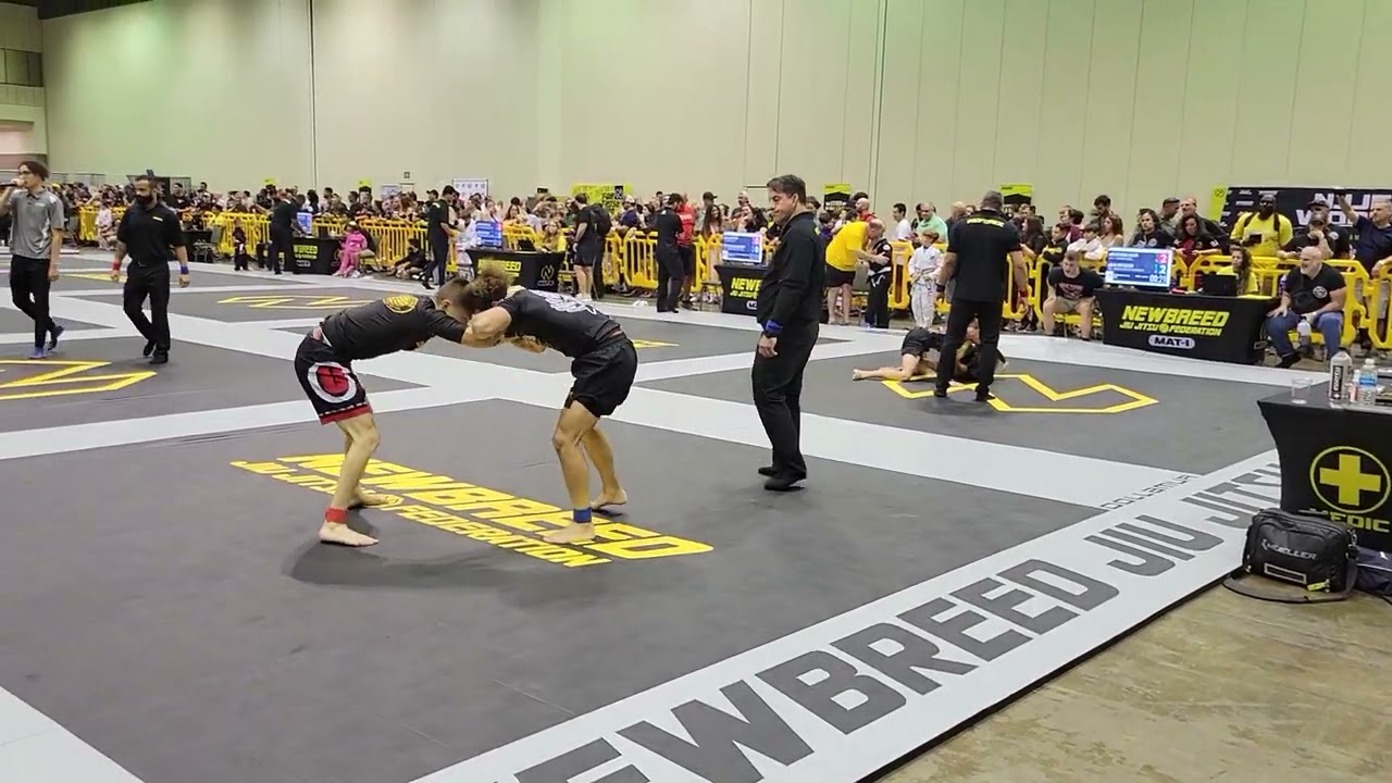 BJJ No Gi Match With Light Weights Battling With Kimura And Pass Attempts. backdrop