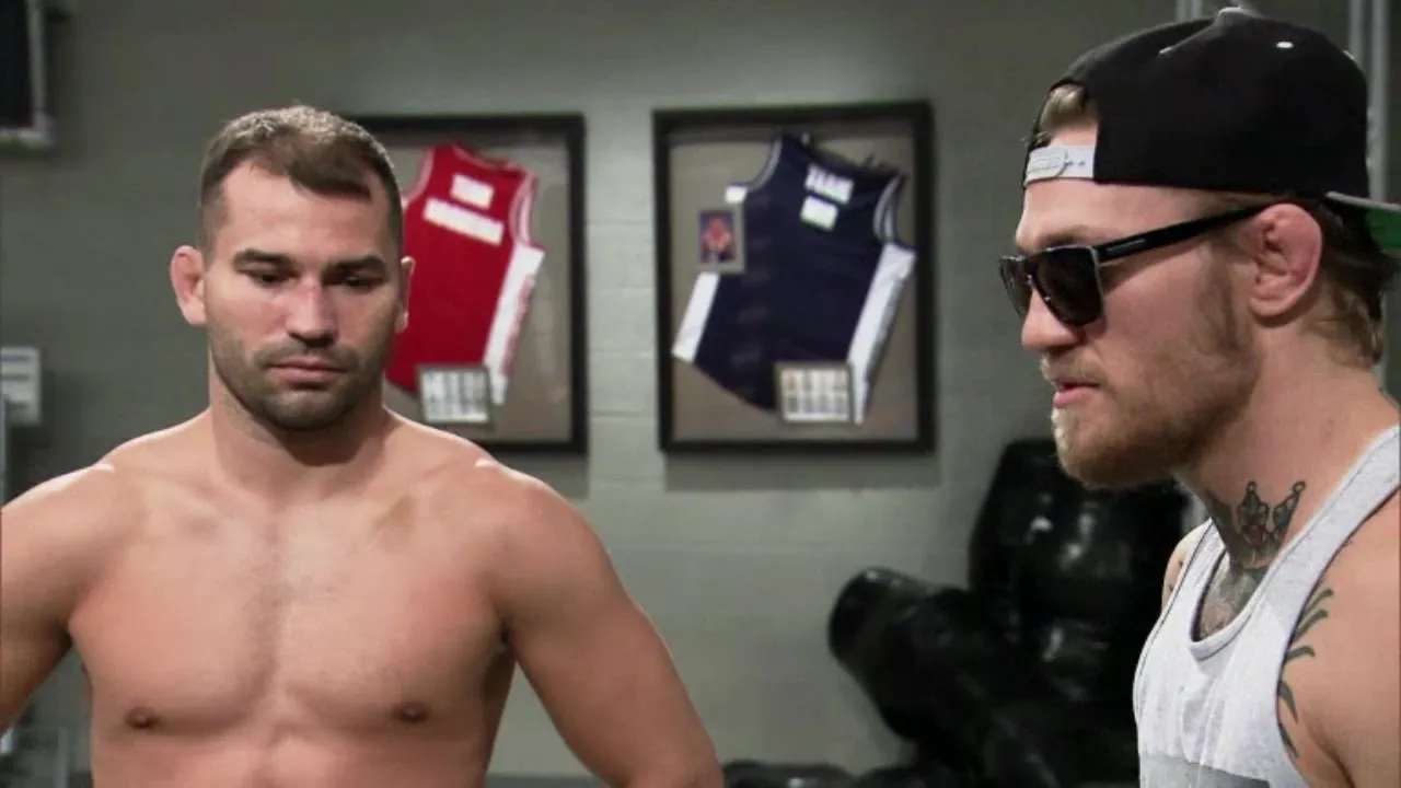 Conor McGregor leads Artem Lobov to TUF Finale background