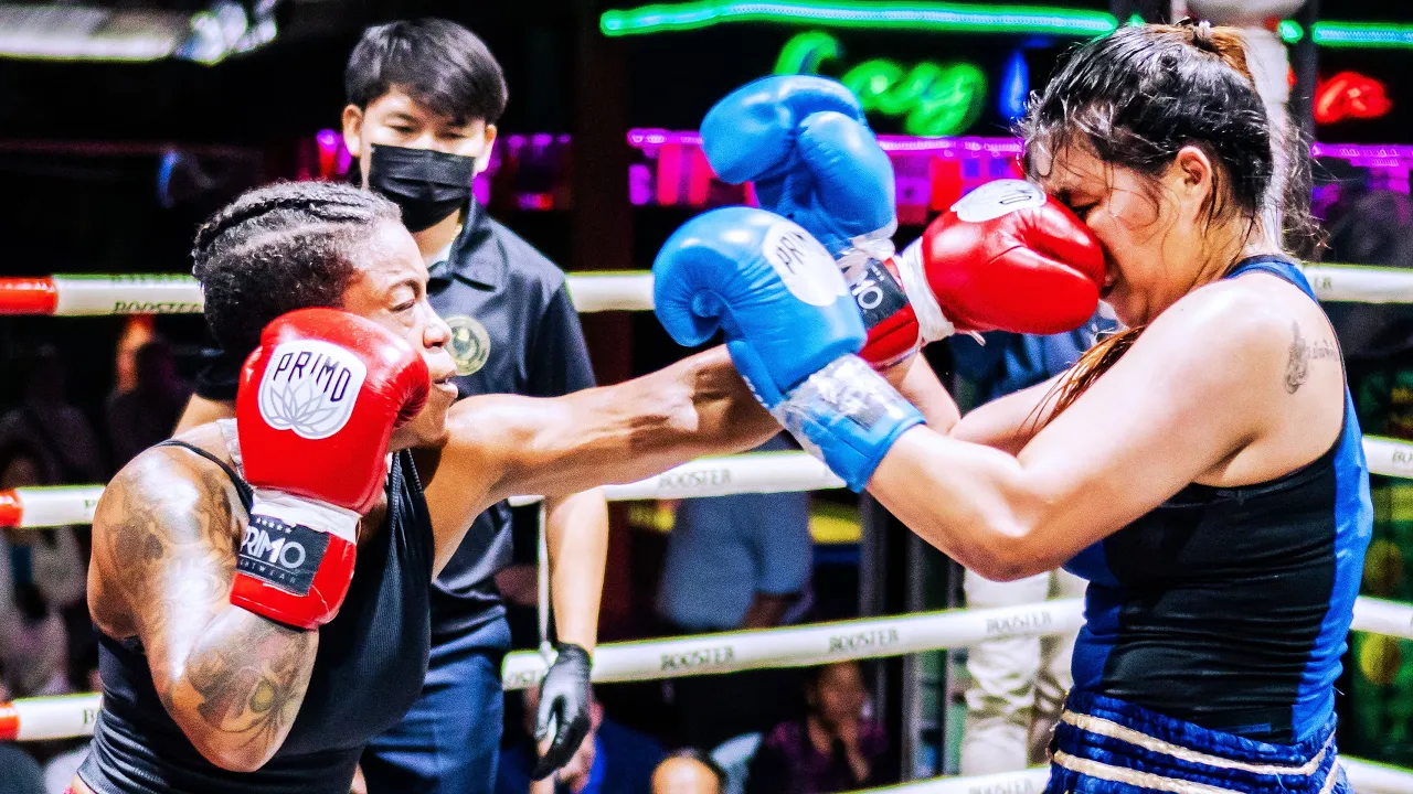DID SHE FIGHT A GIANT? Female Muay Thai Fight background