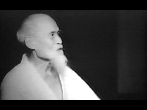 Aikido founder Morihei Ueshiba at the Hombu Dojo (1956) backdrop